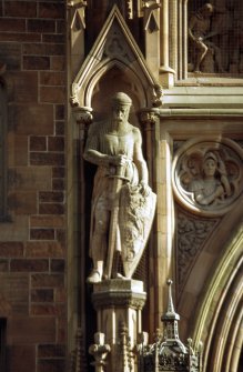 View of statue of Sir William Wallace, in left lower niche of main entrance, N facade.