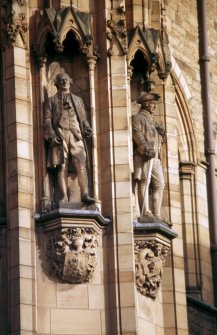 View of statues of David Hume, third from left, and Adam Smith, fourth from left, NW tower.