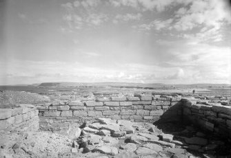 View of remains of domestic buildings.