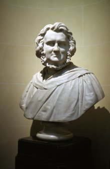 View of marble bust of Sir James Young Simpson, Bart, M. D. by William Brodie, 1871, at the top of the stairs, E side.