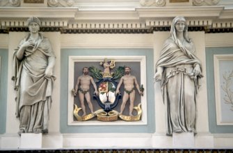 View of the frieze in the Hall, showing the coat of arms of the Royal College of Physicians and representations of Hygeia.