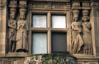 View of two pairs of caryatids representing America (left) and Germany (right), first floor, S bay on South St David Street.