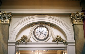 View of Bank of Scotland clock above entrance to telling room.