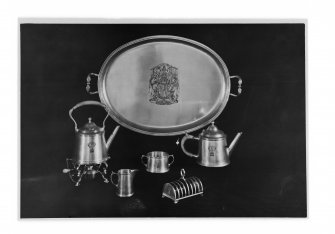 Interior-detail of silver tray, kettle, teapot, sugar and milk jugs, toast rack at Holyrood Palace