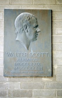 View of relief plaque portrait head of Sir Walter Scott, on wall to right of side entrance to the Royal High School.