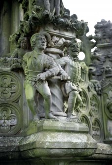View of detail of Holyrood Fountain, showing George Buchanan (Court Fool) stabbing the Duke of Devonshire. the fountain is located in the palace yard at Holyrood, Edinburgh.
