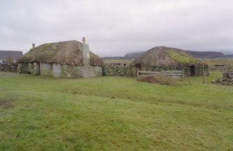 Beaton's Cottage, Skye.  General view of cottage and byre from North West.