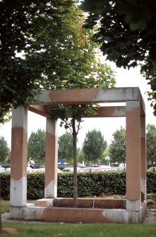 View of sculpture 'Concrete Jungle', in wooded area beside Gyle Shopping Centre carpark, Gyle Avenue.