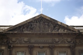 View of 'The Wise and Foolish Virgins' in pediment, and frieze of cherubs below.
