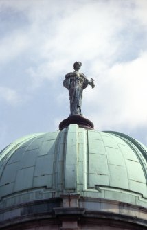 View of sculpture representing Prudence, on top of the dome of the Royal Society of Edinburgh.