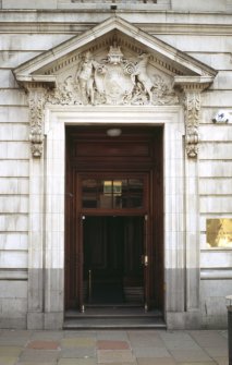 View of coat of arms of the Edinburgh Life Assurance Company, in pediment above door on George Street.