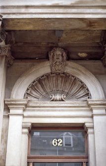 View of keystone head above entrance to 62 George Street.