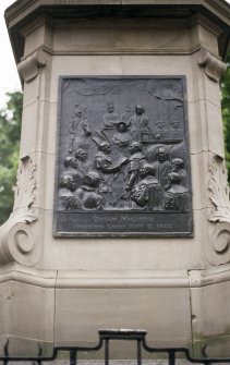 View of panel on pedestal of Queen Victoria Statue, showing Queen Victoria entering Leith in 1842.
