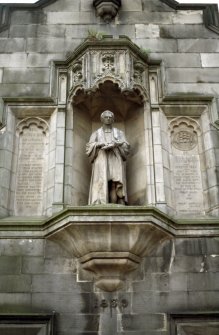 View of statue of Dr Andrew Bell in niche.