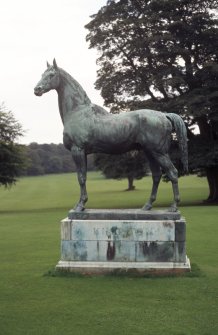View of sculpture of 'King Tom', to E of Dalmeny House.