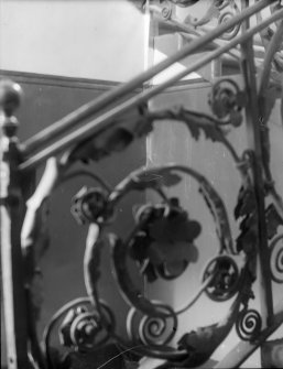 Detail of wrought-iron work on balustrade of principal stair in north range (dated 1685)
