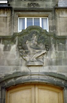 View of relief carving of 'Geology', above main door of Grant Institute Building.