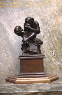 View of sculpture 'Eritus Sicut Deus', on half-landing of main entrance staircase.