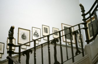 View of animal newels on staircase.