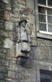 View of half-length sculpture of a Moor, on facade of Morocco Land, Canongate.