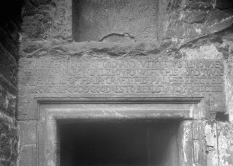 Detail of carved lintel above entrance doorway

