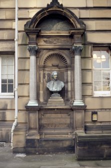 View of memorial to Archbishop Archibald Campbell Tait, in niche on wall of Medical School (in courtyard between McEwan Hall and Reid Concert Hall).
