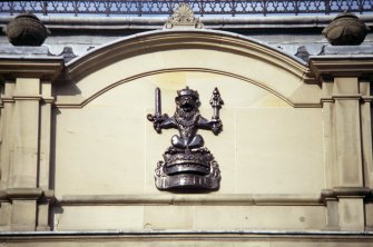 View of heraldic lion, one of two on gables at E and W ends of Crown Office.
