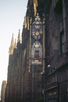 View of The Witchery sign, on bracket above entrance to Boswell's Court.