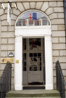 View of entrance, showing profile heads.