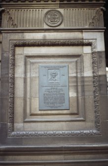 View of James Lind Memorial Plaque, on architectural panel at side of carriage entrance to Medical School.