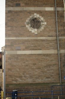 View of carving of 'Education', at first floor level of E facade.