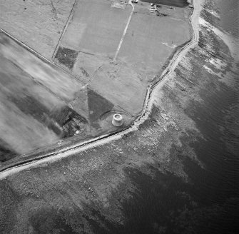 Hoy, Crockness, oblique aerial view, taken from the ESE, centred on the Martello Tower. A curving linear soilmark is visible in the centre left of the photograph.