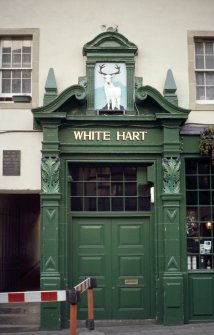 View of White Hart Inn sign.