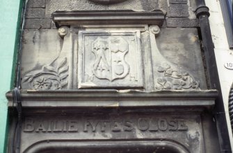 View of armorial panel, above entrance to Bailie Fyfe's Close.