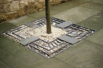 View of 'Tree Stories', one of three tree surrounds in Roxburgh's Close and Roxburgh's Court.