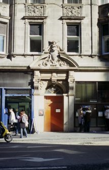 View of doorway to No.29 North Bridge (fire exit for hotel), showing cherub's head and cartouche.