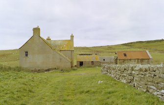 Farmhouse and outbuildings from east