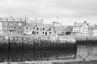 General view of Whale Hotel and Quay wall, Eyemouth from E.