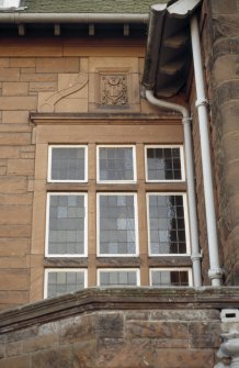 View of carved panel on facade of Scott House, 11 Kinnear Road.