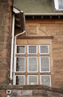 View of carved panel on facade of Jeffrey House, 13 Kinnear Road.