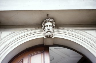 View of keystone head, above entrance to 109 Princes Street.