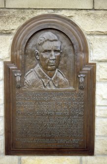 Detailed view of bronze plaque on Thomas Peck Hunter Memorial.