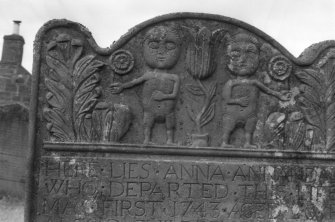 Detail of gravestone of Anna Annandale d. 1743 at Church of Logie Churchyard.
