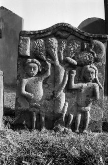 View of gravestone for Agnes Herese d. 1707 depicting Adam and Eve at Kells Churchyard.
