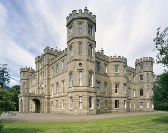 View of SE and SW elevations from S showing castellated tower