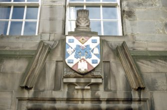 View of coat of arms of the Scottish Central Library, above door to National Library of Scotland Department of Administration.