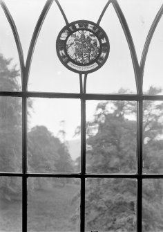 General view of stained glass roundel in window.