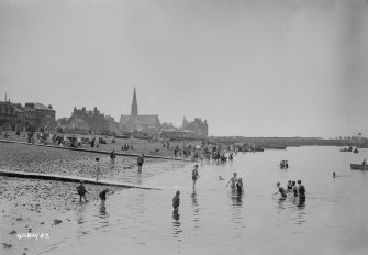 View of Largs and bathers
