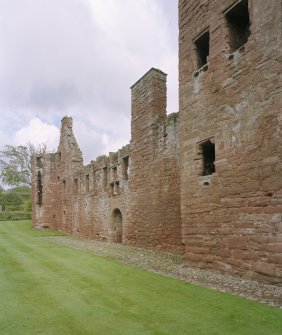 Oblique view of south front of castle from SE.