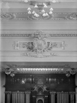 Interior detail of auditorium in the Usher Hall, Edinburgh, showing the decorative plaster cartouche containing the three castles of the City Arms and the anchor.